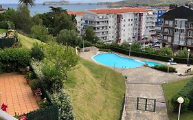 Apartamento con vistas al mar y piscina